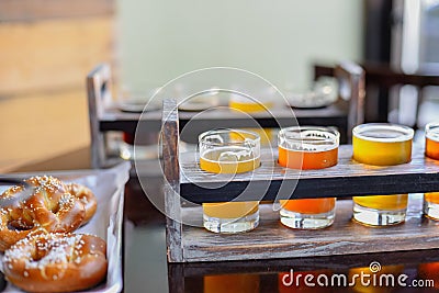 Pretzels and beer flights for game day Stock Photo