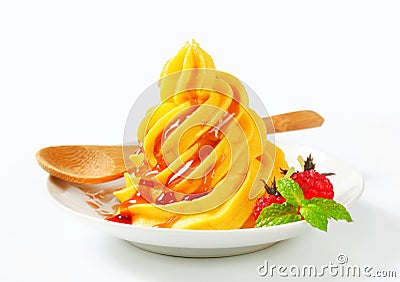 Soft serve ice cream with raspberry sauce Stock Photo