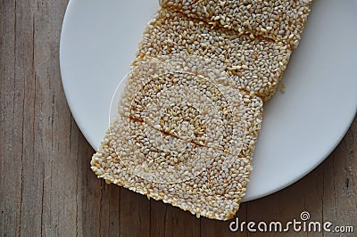 Soft sesame bar Chinese sweetmeat on dish Stock Photo