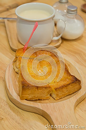 Soft shot of Honey toast with ice cream and honey syrup,Worm tone Stock Photo