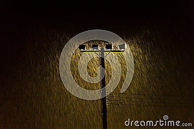 Soft shot of Night Street lamp lights in Heavy rain Stock Photo