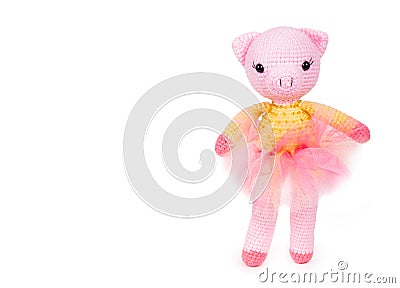Soft toy pig. Knitted toy pig. Plush crocheted pig Stock Photo