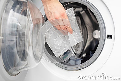 Soft your laundry by droping dryer sheets into your dryer or washing mashine Stock Photo