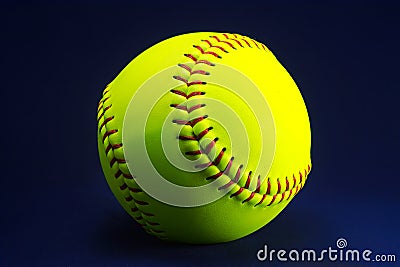 Softball on a blue background Stock Photo