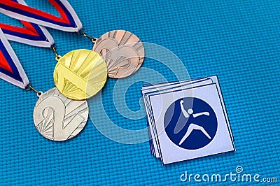 Softball icon and medal set, gold silver and bronze medal, blue background. Original wallpaper for summer olympic game in Tokyo Stock Photo