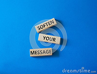 Soften your Message symbol. Concept words Soften your Message on wooden blocks. Beautiful blue background. Business concept. Copy Stock Photo