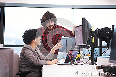 Software developers couple writing programming code Stock Photo
