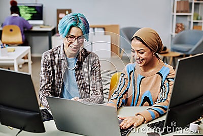 Software developers using computers in office Stock Photo