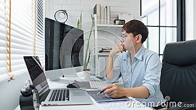 Software development concept, Male programmer read data code to thinking about developing website Stock Photo