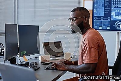 Software Engineer Using Computers Stock Photo
