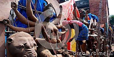 Soil made hindu religious sculpture art lord durga statue in workshop Editorial Stock Photo