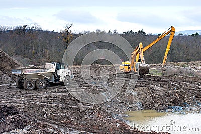 Soil pollution restoration with excavating and earthmoving work. Stock Photo