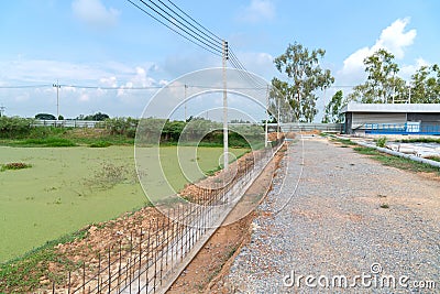 Soil retaining walls prevent road collapse Stock Photo