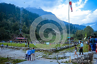 SOLANG VALLEY, MANALI, HIMACHAL PRADESH, India OCTOBER 26 2017: Tourists walking around on ski ground at Paragliding site. Editorial Stock Photo