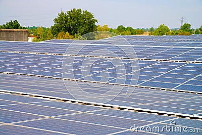 Solar cells on the roof of a factory Stock Photo