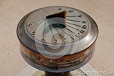 Solar clock showing time four o'clock Stock Photo