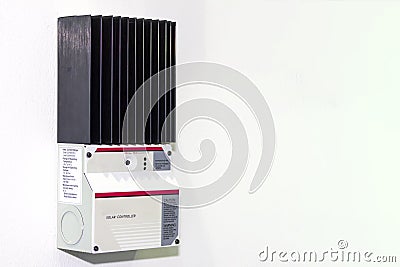 Solar Controller equipment for electric charge of solar energy industrial on white wall with copy space Stock Photo