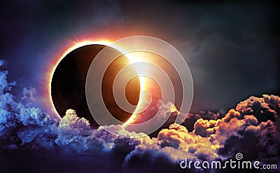 Solar Eclipse In Clouds Stock Photo