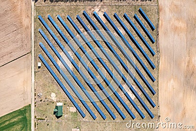 Solar farm aerial view, rows of PV panels Stock Photo