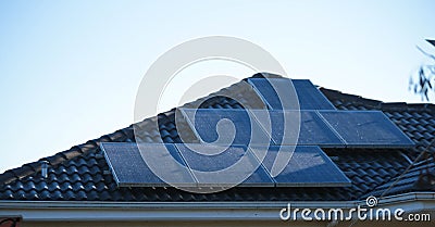 solar heater on the house roof in sunny cold winter day Stock Photo