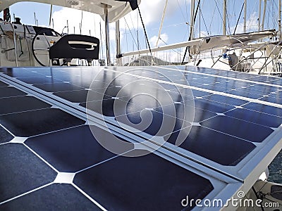 Solar panel detail of boat in marina in the French West Indies. Solar charging battery aboard a yacht. Close up of plate for Editorial Stock Photo