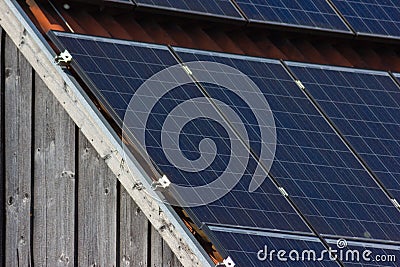 solar panel on rooftop on wooden facade Stock Photo