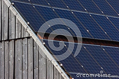 solar panel on rooftop on wooden facade Stock Photo