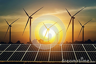 solar panel and turbine with sunset background. clean energy power in nature Stock Photo