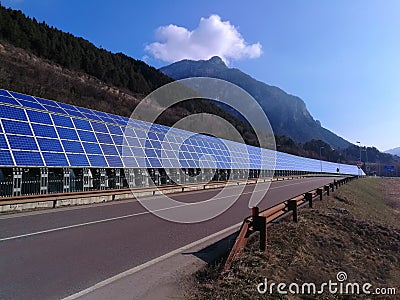 Solar panels along road highway Stock Photo