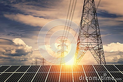 Solar panels with electricity pylon and sunset. Clean power energy concept Stock Photo