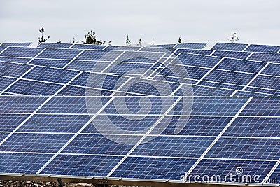 Solar panels filling the landscape at a new Solar Farm Stock Photo