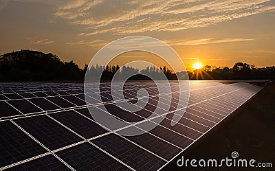 Solar panels with warm sunrise sky Stock Photo