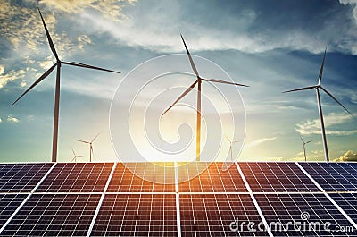 solar panels with wind turbines and sunset. concept clean energy Stock Photo