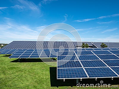 Solar park photovoltaic system stands in the field Stock Photo