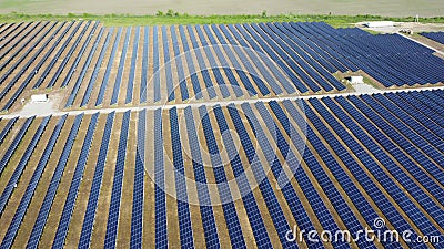 Solar power plant. Many blue panels of large solar power plant Aerial drone view Stock Photo