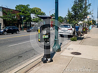 A solar powered paid parking station Editorial Stock Photo