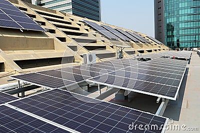 Solar PV System on Concrete Roof Deck Front View Stock Photo