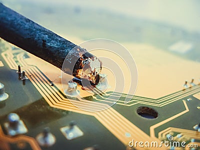 Soldering contacts on the board Stock Photo