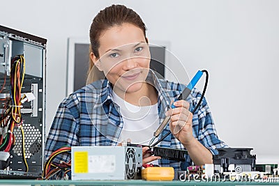 Soldering iron electronic printed board Stock Photo