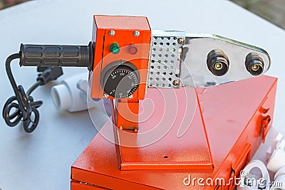 Soldering iron for welding polypropylene pipes Stock Photo