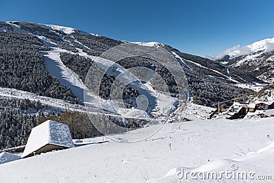 Soldeu, Canillo, Andorra on an autumn morning in its first snowfall of the season. You can see almost completed the works of the t Stock Photo