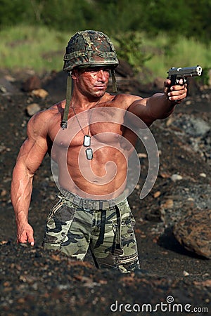 Soldier in action Stock Photo