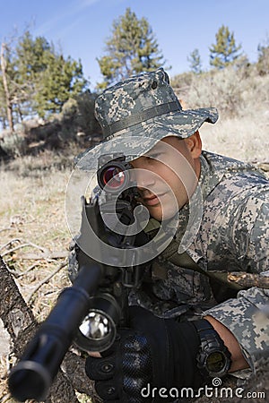 Soldier Aiming Machine Gun Stock Photo