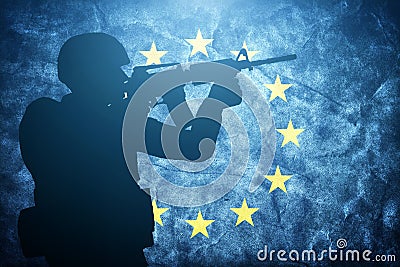 Soldier on grunge European Union flag. Army, military Stock Photo