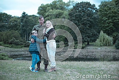 Soldier and his beloved family Stock Photo