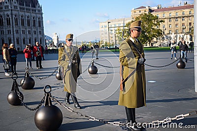 Soldier on patrol by the Parliament House, Budapest Editorial Stock Photo