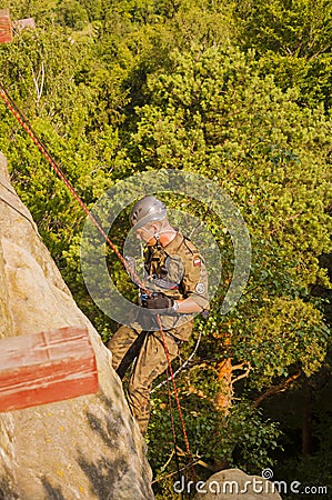 Soldier of the Polish army during the exercises from the rope ri Editorial Stock Photo