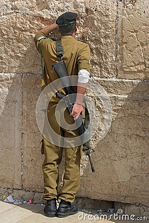 Soldier praying Editorial Stock Photo