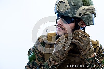 Soldier preparing gear for action Stock Photo