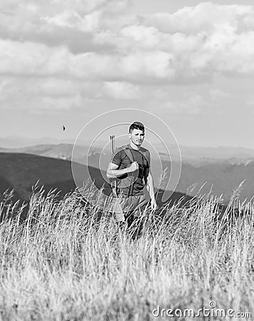 Soldier with rifle. Man with weapon military clothes in field nature background. Army forces. State border guard service Stock Photo